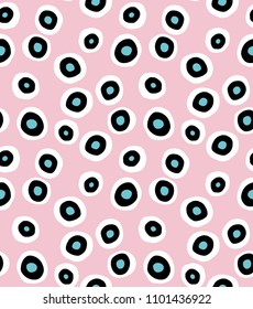 Funny Abstract Dotted Seamless Vector Pattern. Irregular Geometric Jumble Vector Print with Black, Blue Dots in a White Circles Isolated on a Pink Background ideal for Fabric,Textile, Wrapping Paper.