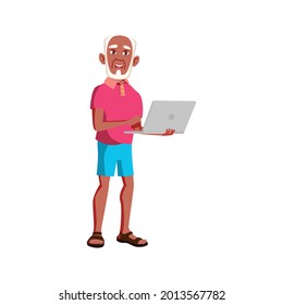 funny african man pensioner holding laptop device at home cartoon vector. funny african man pensioner holding laptop device at home character. isolated flat cartoon illustration