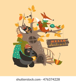 Funny animals on the autumn tree