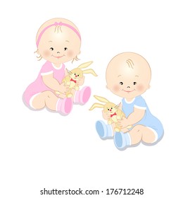 Funny babies holding a toy rabbit in hands, isolated on white background