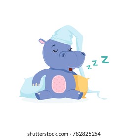 Funny baby hippo character in a hat sleeping on a pillow, cute behemoth African animal vector Illustration