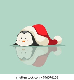 Funny baby penguin lies on the ice under the Santa Claus hat. Vector cartoon animal character. Winter illustration.