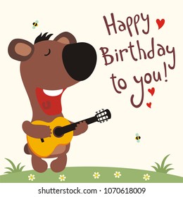 Funny bear with guitar sings song happy birthday to you. Greeting card.
