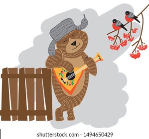 Funny bear plays the balalaika. Bullfinches are sitting on a branch. Winter in the village