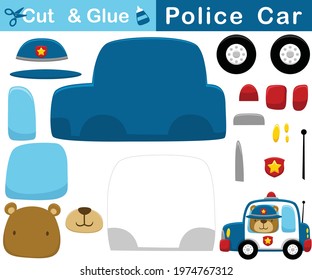 Funny bear in police cap on police car. Education paper game for children. Cutout and gluing. Vector cartoon illustration
