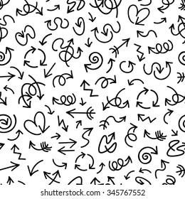  Funny black hand drawn arrows on white background. Seamless vector pattern. 