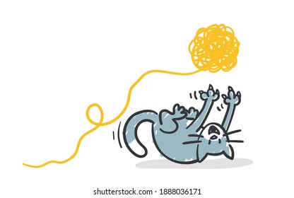 funny blue cat is playing with a ball of wool