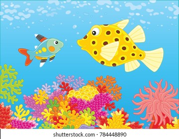 A funny boxfish and an x-ray fish swimming in blue water over an amazing colorful coral reef in a tropical sea, a vector illustration in cartoon style