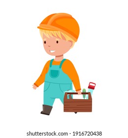 Funny Boy Builder in Hard Hat and Overall Carrying Box with Tools Vector Illustration