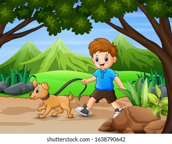 Funny boy with his pet walking in the park