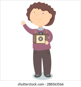 funny boy photographer with retro camera waving his hand