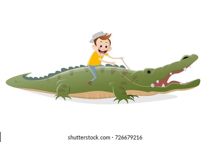 funny boy riding on a crocodile