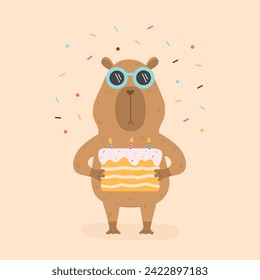 Funny capybara with birthday cake