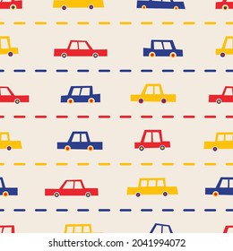 Carros divertidos. Patrón de vectores sin fisuras con coches abstractos divertidos en colores brillantes. Automóviles azules, rojos y amarillos perfectos para los niños, tejidos o papel pintado. 
