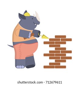 Funny Cartoon builder rhino with trowel and level tool working around a brick wall. Vector illustration eps 10