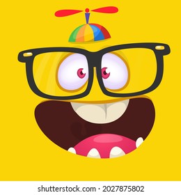 Funny cartoon nerd monster face wearing eyeglasses. Illustration of cute and happy mythical alien creature expression. Halloween design. Great for package design