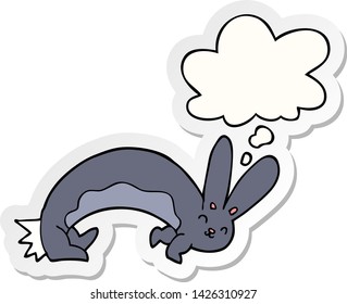 funny cartoon rabbit with thought bubble as a printed sticker