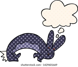 funny cartoon rabbit with thought bubble in comic book style