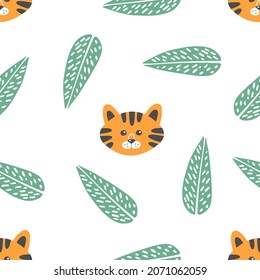 Funny cartoon vector pattern. Cute adorable tiger cub and green tropical leaves on a white background. Abstract and fun everyday children's pattern, background or print for textiles, wrappers or gifts