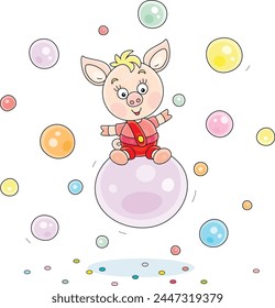 Funny cartoony little piglet riding on a big soap bubble among many other colorful soapbubbles flying around, vector cartoon illustration on a white background