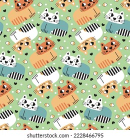 Funny childish seamless pattern with cute cats. Cute big-eyed little animals on soft green background for texture nursery wallpaper. Cartoon striped pets for children's fabric print. Kitten ornament.