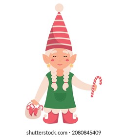 Funny Christmas gnome isolated on white background. Santa elf with lollipops.