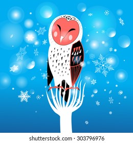 funny Christmas owl on a snowy background

