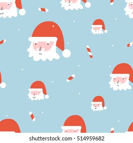 Funny Christmas seamless pattern with Santa's faces and candies. 