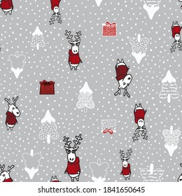 Funny christmas vector seamless pattern with deer in a sweater, present and christmas tree. Christmas motives background printing on paper, textiles, fabric, wallpaper.