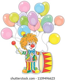 Funny circus clown beating his colorful drum, vector illustration in a cartoon style