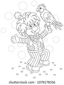 Funny circus clown playing with his parrot, black and white vector illustration in a cartoon style for a coloring book