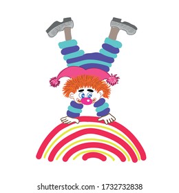 Funny clown. A cheerful clown stands on a colorful rainbow.