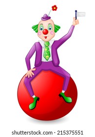 Funny clown over ball