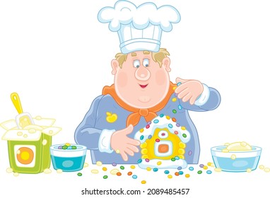 Funny cook confectioner in a chef hat standing at his kitchen work table and decorating a fancy Christmas gingerbread in a form of a sweet toy house, vector cartoon illustration isolated on white