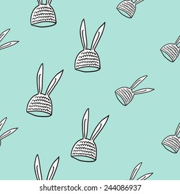 Funny cute new born welcome baby boy baby beanie vector seamless pattern on light blue background. Set of isolated elements. Chess grid order pattern.