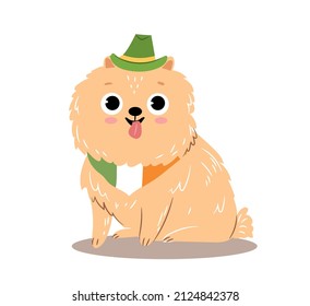 Funny dog in green hat and flag on neck. Pet in cute clothes