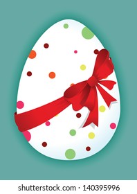 Funny egg with a red bow