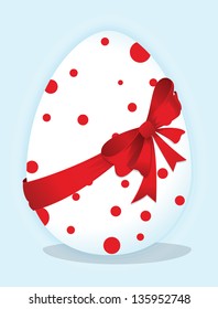 Funny eggs with a red bow