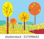 Funny fall landscape with flowers and trees in the garden