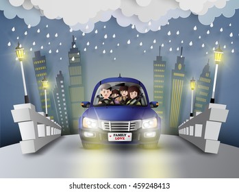 Funny family driving the car with the raining.paper art style.