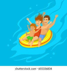 Funny Family sliding on tube in aquapark