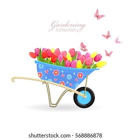 funny garden wheelbarrow with tulips and butterflies. gardening collection for your design