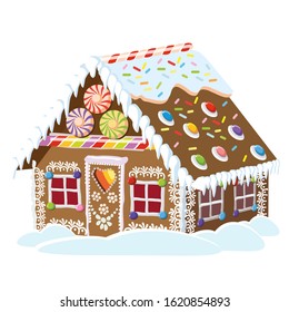 Funny gingerbread house made of sweets and cookies. Winter sweet souvenir.