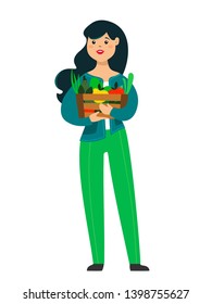 Funny girl is holding a box with fruits, vegetables and herbs. Vector illustration in cartoon style on a white background.