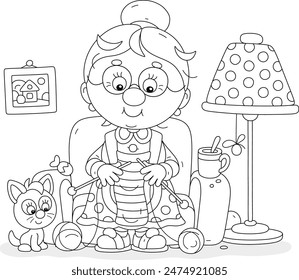 Lustige Oma sitzt in einem gemütlichen Sessel in der Nähe einer Stehlampe und strickt einen warmen gestreiften Schal für ihre kleinen Enkel, ein kleines Kätzchen spielt mit einer Wolle, Vektorgrafik Cartoon Illustration