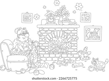 Funny granny with her merry cat sitting in an old easy chair and knitting a long striped scarf by a home bricky fireplace with cheerfully burning wood, black and white outline vector cartoon illustrat