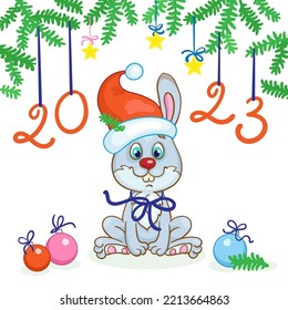 Funny gray bunny in a red cap sits under a Christmas tree with glass balls - a symbol of the new year 2023. Card in cartoon style. Isolated on white background. Vector illustration