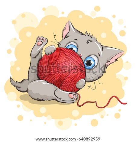 Funny gray kitten playing with a ball of yarn. Background yellow