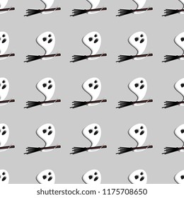 Funny halloween ghost with broom seamless pattern. Vector illustration for baby and kids fashion textile print.