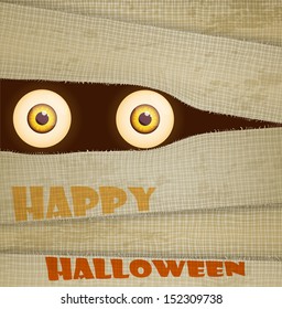 Funny Halloween greeting card (invitation) with big eyes of mummy.